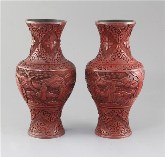 A pair of Chinese cinnabar lacquer baluster vases, 19th century, height 25.5cm